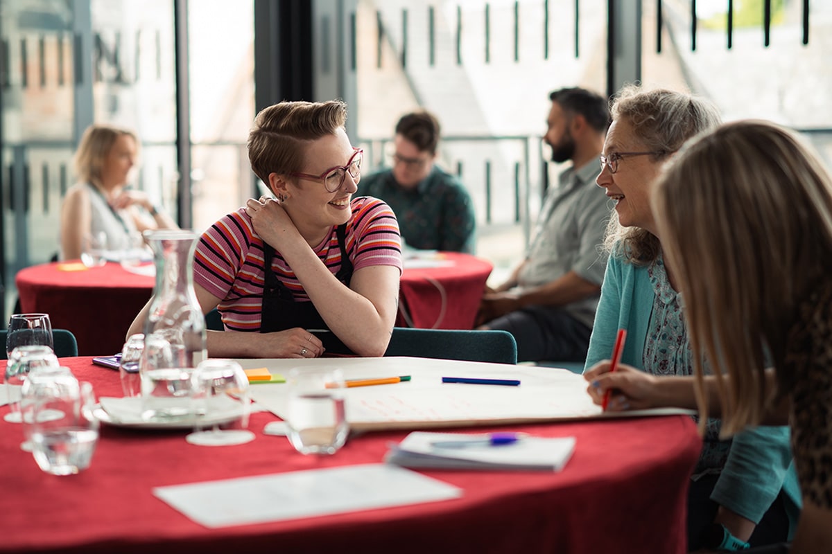 Summit attendees engaged in one of the day’s facilitated workshops.