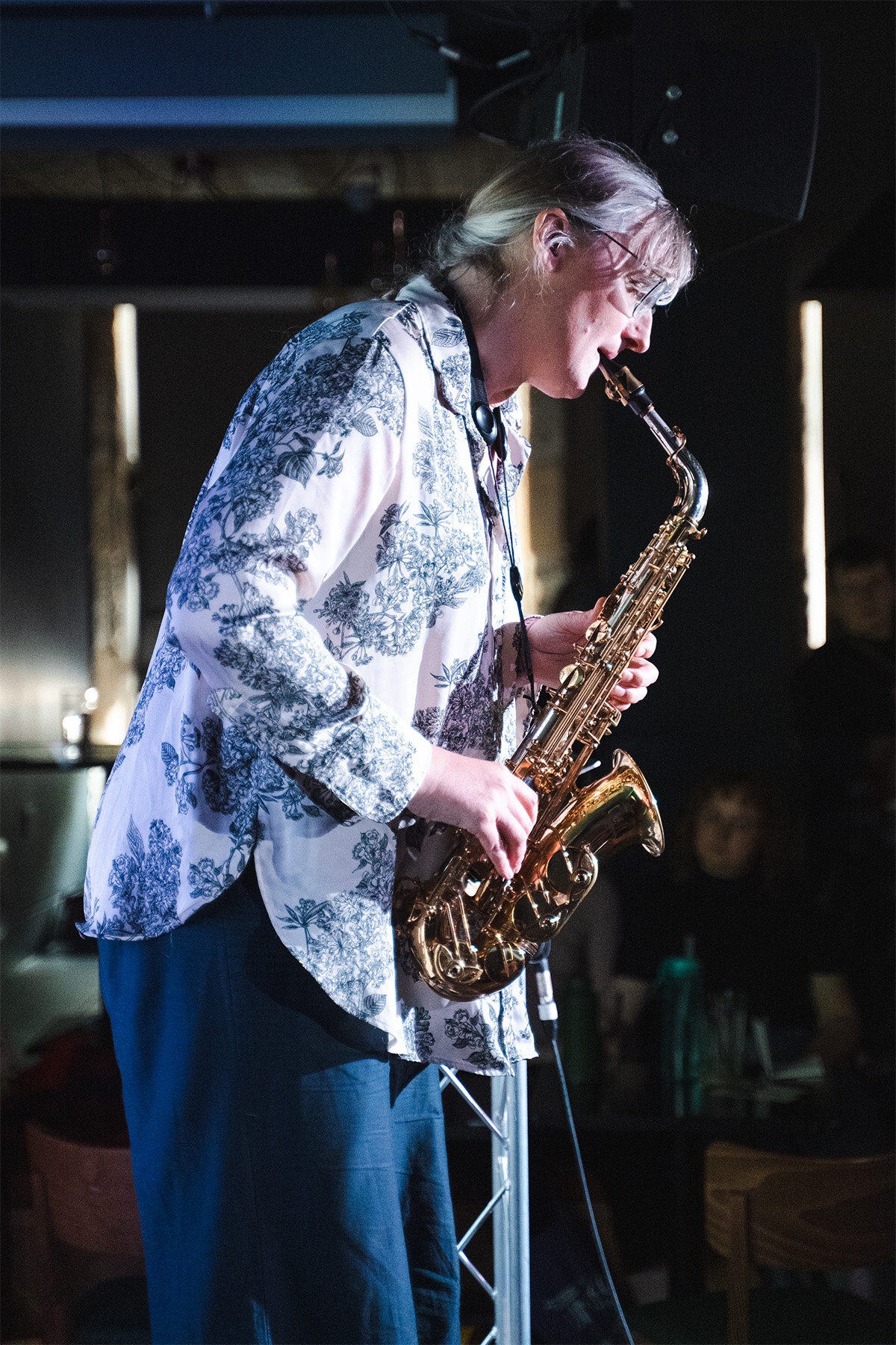 Katherine Wyers performs an improvised jazz solo on the saxophone.