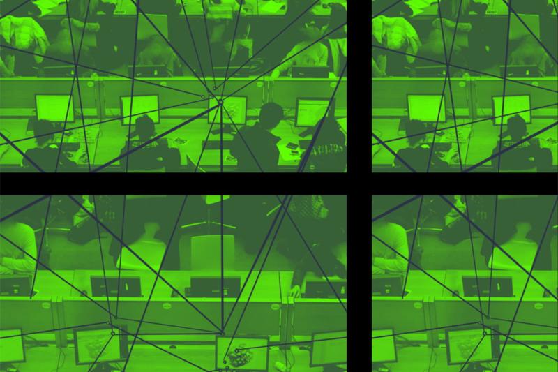 Rows of people sitting behind computer screens behind a green overlay: Hanna Barakat & Cambridge Diversity Fund, https://betterimagesofai.org